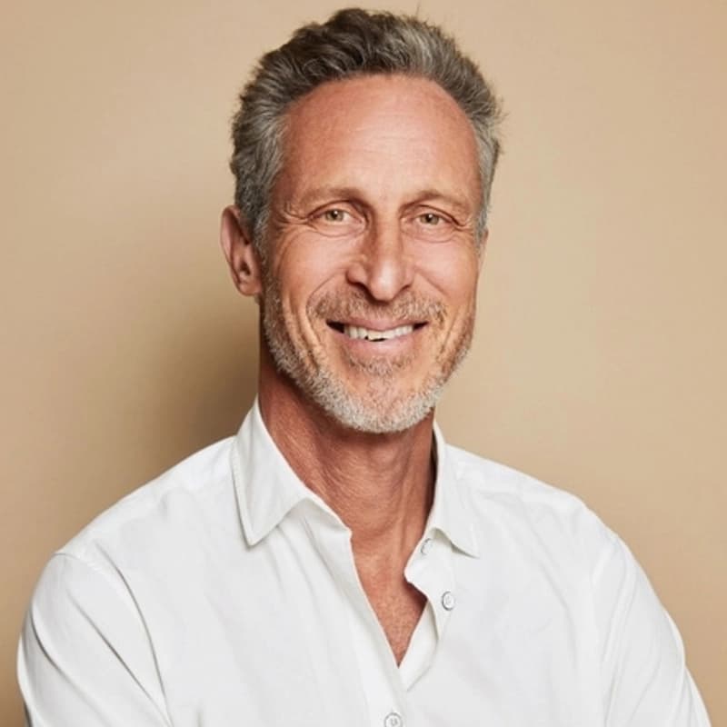 Portrait image of Dr. Mark Hyman smiling towards the camera