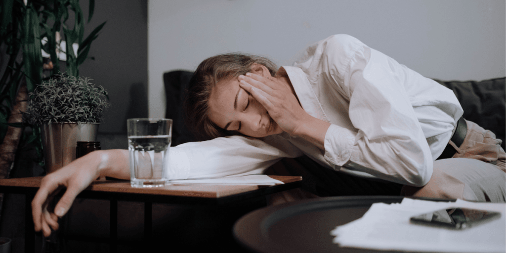 The woman is having a headache